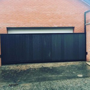 Black wood and steel driveway gate